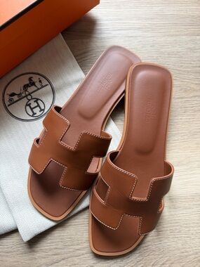 Hermes Gold Oran Leather Slide Sandals